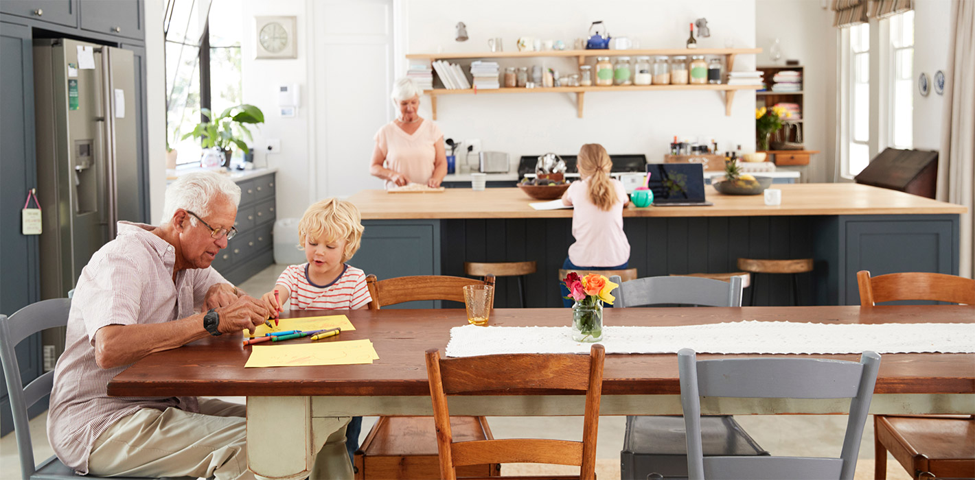 Family having diverse activities in a kitchen